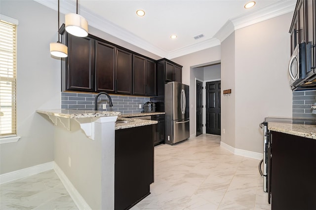 9330 Meadow Hunt Way, Winter Garden, FL 34787 - kitchen with stainless steel appliances, light marble finish flooring, a peninsula, light stone counters, and ornamental molding