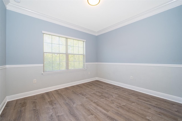 9330 Meadow Hunt Way, Winter Garden, FL 34787 - spare room featuring ornamental molding and wood finished floors