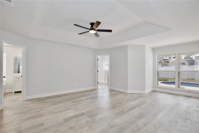 542 Terrace Cove Way, Orlando, FL 32828 - unfurnished room featuring baseboards, a ceiling fan, visible vents, and a raised ceiling