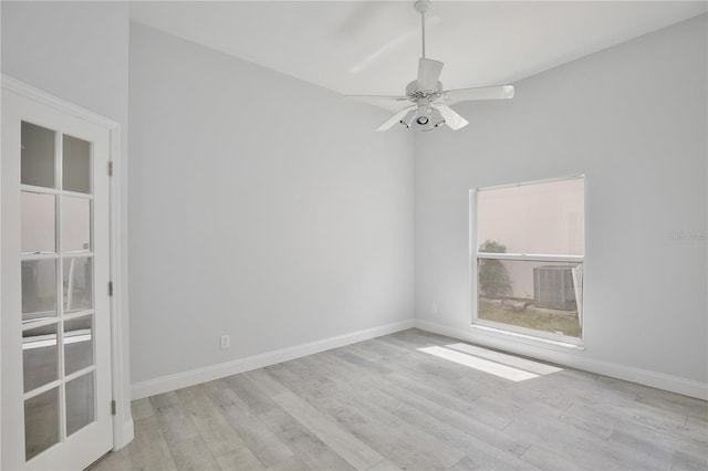 542 Terrace Cove Way, Orlando, FL 32828 - empty room featuring baseboards, a ceiling fan, and wood finished floors