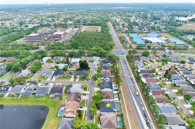 542 Terrace Cove Way, Orlando, FL 32828 - drone / aerial view featuring a water view and a residential view