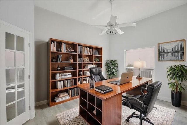 542 Terrace Cove Way, Orlando, FL 32828 - office featuring ceiling fan, baseboards, and light wood-style floors