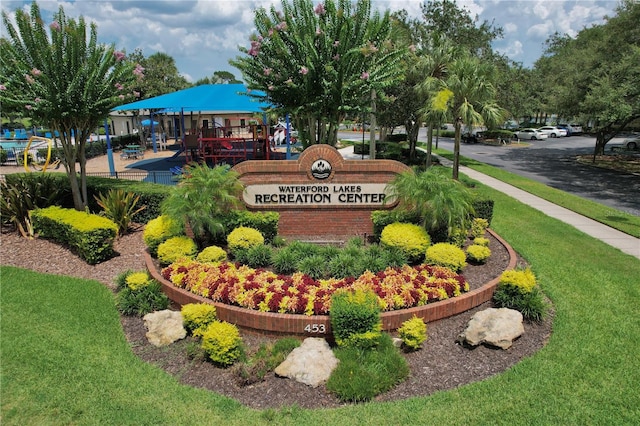 542 Terrace Cove Way, Orlando, FL 32828 - community / neighborhood sign featuring a yard