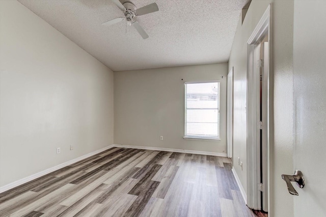 294 San Gabriel St, Winter Springs, FL 32708 - unfurnished room featuring a textured ceiling, baseboards, ceiling fan, and wood finished floors