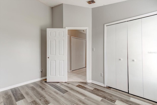 294 San Gabriel St, Winter Springs, FL 32708 - unfurnished bedroom featuring light wood-type flooring and a closet