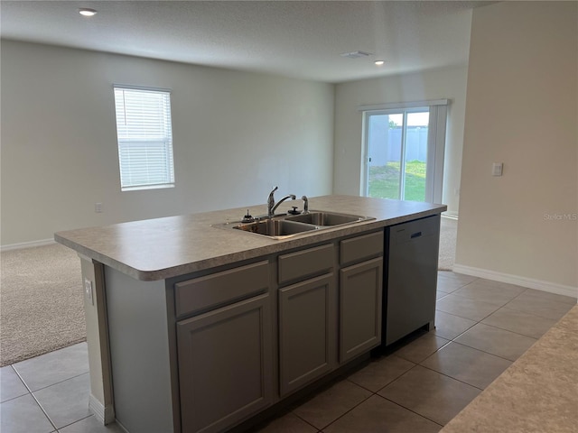 3009 Tansy St, Tavares, FL 32778 - kitchen featuring a sink, a wealth of natural light, gray cabinetry, and stainless steel dishwasher