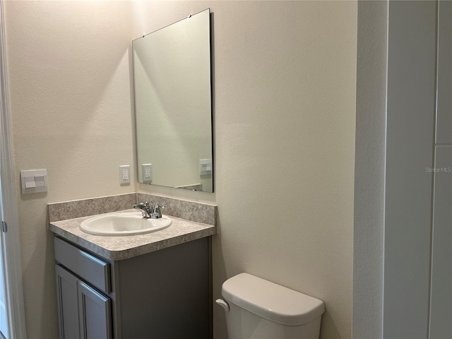 3009 Tansy St, Tavares, FL 32778 - bathroom featuring toilet and vanity