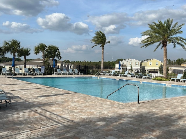 3009 Tansy St, Tavares, FL 32778 - community pool featuring fence and a patio