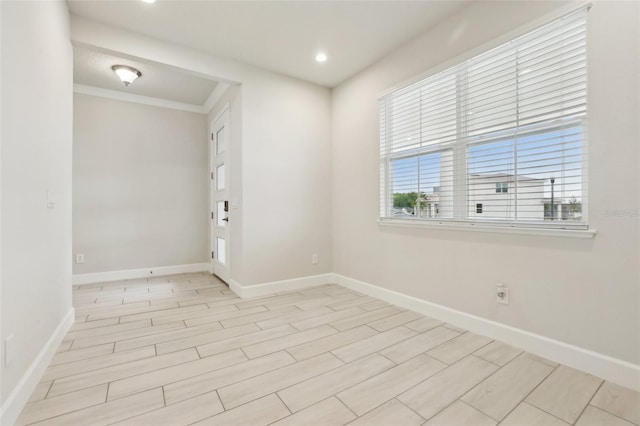 2785 Park Ridge St, Apopka, FL 32712 - spare room featuring ornamental molding, recessed lighting, and light wood-style flooring