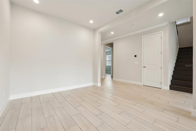 2785 Park Ridge St, Apopka, FL 32712 - empty room featuring stairway, recessed lighting, and light wood finished floors