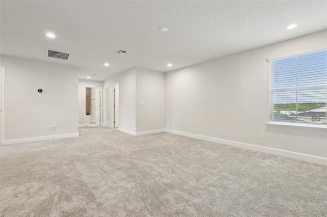 2785 Park Ridge St, Apopka, FL 32712 - unfurnished room featuring recessed lighting, light colored carpet, and a textured ceiling