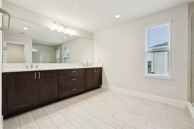 2785 Park Ridge St, Apopka, FL 32712 - full bath with double vanity, a shower stall, and recessed lighting