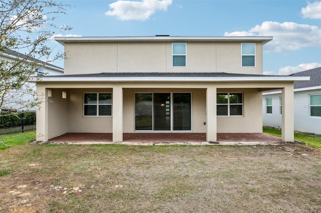 2785 Park Ridge St, Apopka, FL 32712 - rear view of property featuring stucco siding and a patio