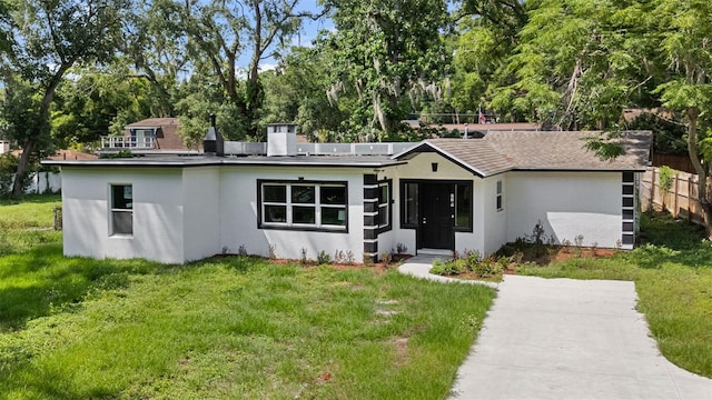 239 S Lake Cortez Dr, Apopka, FL 32703 - view of front of home featuring stucco siding and view of scattered trees