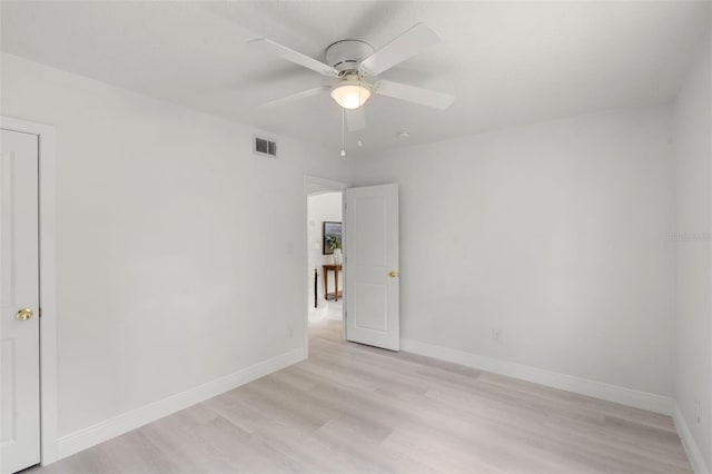 239 S Lake Cortez Dr, Apopka, FL 32703 - empty room featuring light wood-type flooring, a ceiling fan, and baseboards