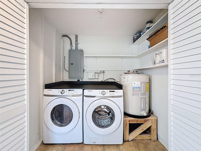 1121 49th Ave N, Saint Petersburg, FL 33703 - washroom with water heater, electric panel, laundry area, and washing machine and clothes dryer