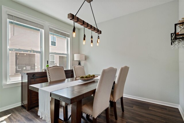 12330 Koshiba Aly, Orlando, FL 32827 - dining area with baseboards and dark wood-style floors