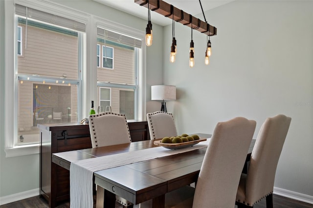 12330 Koshiba Aly, Orlando, FL 32827 - dining space with baseboards and dark wood-style floors
