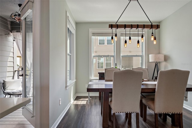 12330 Koshiba Aly, Orlando, FL 32827 - dining area featuring baseboards and dark wood-type flooring