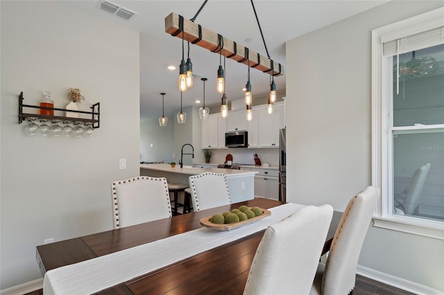 12330 Koshiba Aly, Orlando, FL 32827 - dining area with baseboards and visible vents