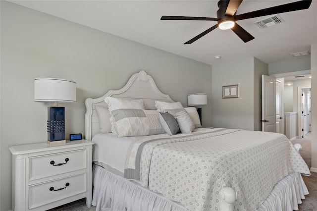 12330 Koshiba Aly, Orlando, FL 32827 - bedroom with dark carpet, ceiling fan, and visible vents