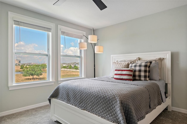 12330 Koshiba Aly, Orlando, FL 32827 - carpeted bedroom featuring baseboards and a ceiling fan