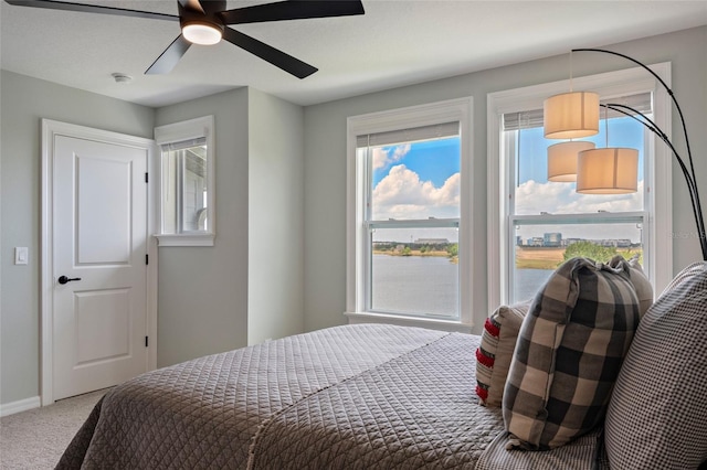 12330 Koshiba Aly, Orlando, FL 32827 - carpeted bedroom featuring a ceiling fan and baseboards