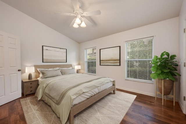 39900 Bayview Dr, Lady Lake, FL 32159 - bedroom with baseboards, lofted ceiling, ceiling fan, and wood finished floors