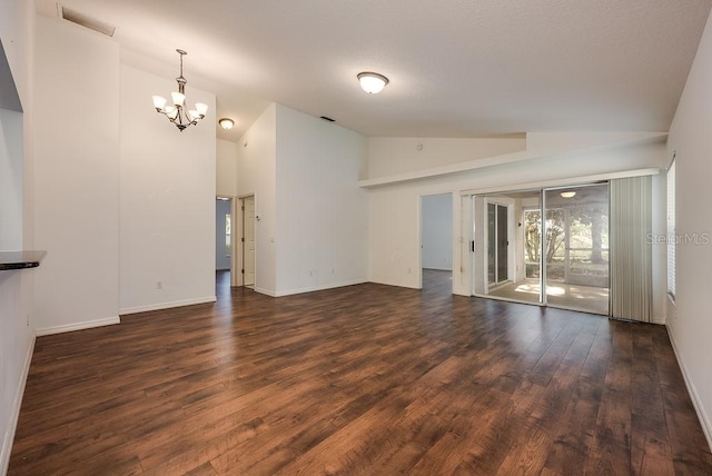 39900 Bayview Dr, Lady Lake, FL 32159 - unfurnished living room with baseboards, visible vents, an inviting chandelier, and dark wood finished floors