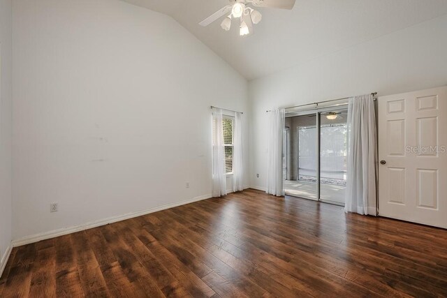 39900 Bayview Dr, Lady Lake, FL 32159 - unfurnished bedroom featuring high vaulted ceiling, wood finished floors, access to outside, baseboards, and ceiling fan