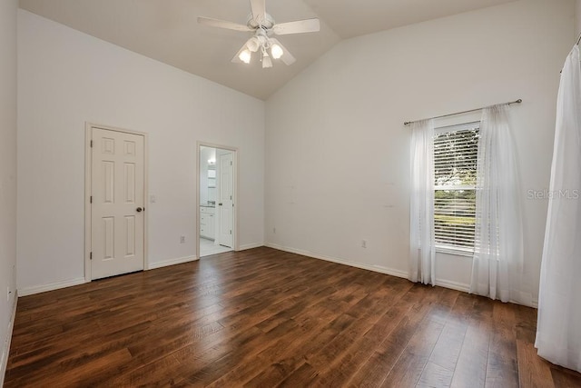 39900 Bayview Dr, Lady Lake, FL 32159 - spare room featuring a ceiling fan, high vaulted ceiling, hardwood / wood-style flooring, and baseboards