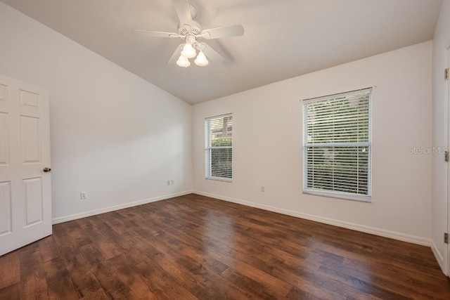 39900 Bayview Dr, Lady Lake, FL 32159 - unfurnished room featuring baseboards, ceiling fan, vaulted ceiling, and dark wood finished floors