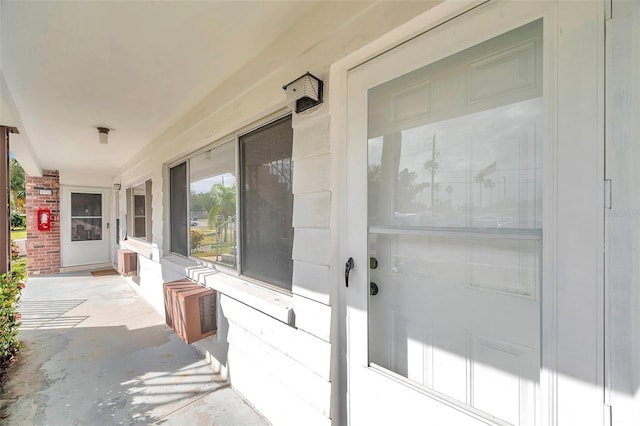 doorway to property featuring a porch