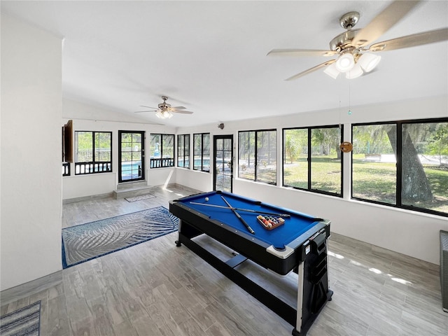 11404 Lokanotosa Trl, Orlando, FL 32817 - game room with light wood-style floors, pool table, lofted ceiling, and ceiling fan