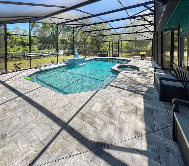 11404 Lokanotosa Trl, Orlando, FL 32817 - view of swimming pool with a patio, a pool with connected hot tub, and a lanai