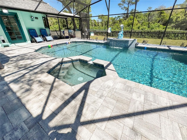 11404 Lokanotosa Trl, Orlando, FL 32817 - view of swimming pool featuring a pool with connected hot tub, a lanai, and a patio area