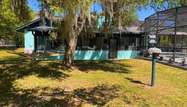 11404 Lokanotosa Trl, Orlando, FL 32817 - view of yard with a lanai and an outdoor pool