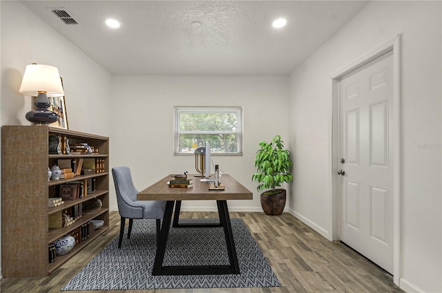 4385 Cassius St, Orlando, FL 32811 - office featuring wood finished floors, recessed lighting, and baseboards