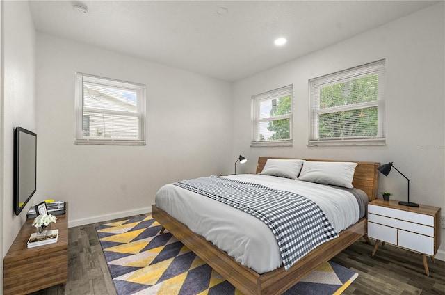 4385 Cassius St, Orlando, FL 32811 - bedroom featuring baseboards, wood finished floors, and recessed lighting