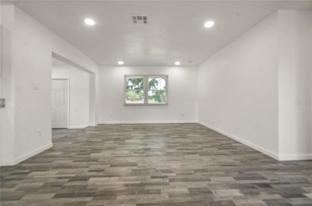 4385 Cassius St, Orlando, FL 32811 - spare room featuring recessed lighting, wood finished floors, and baseboards