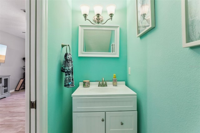 534 Wilton Cir, Sanford, FL 32773 - bathroom featuring wood finished floors and vanity