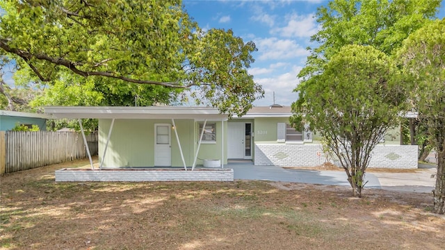 5201 Van Aken Dr, Orlando, FL 32808 - view of front of home with fence