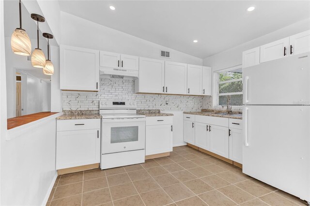 5201 Van Aken Dr, Orlando, FL 32808 - kitchen featuring under cabinet range hood, white cabinets, visible vents, and white appliances