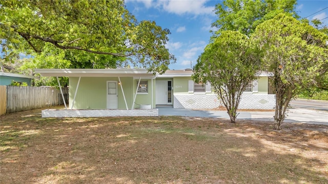 5201 Van Aken Dr, Orlando, FL 32808 - view of front of home featuring fence