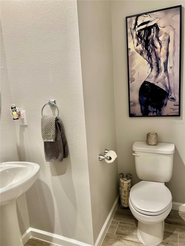 11826 Sky Acres Ter, Bradenton, FL 34211 - bathroom featuring baseboards and wood finished floors