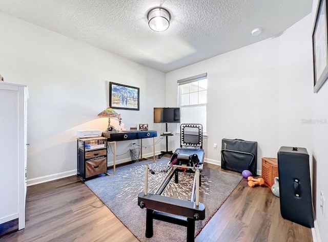 11826 Sky Acres Ter, Bradenton, FL 34211 - office area featuring wood finished floors and a textured ceiling