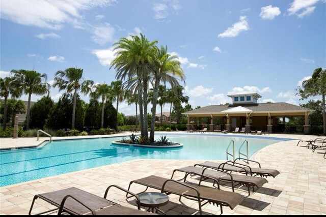 11826 Sky Acres Ter, Bradenton, FL 34211 - community pool featuring a patio