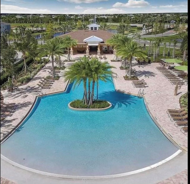 11826 Sky Acres Ter, Bradenton, FL 34211 - community pool with a patio area