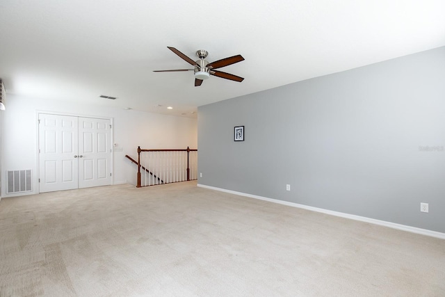 563 Copperdale Ave, Winter Garden, FL 34787 - spare room with baseboards, ceiling fan, visible vents, and light carpet