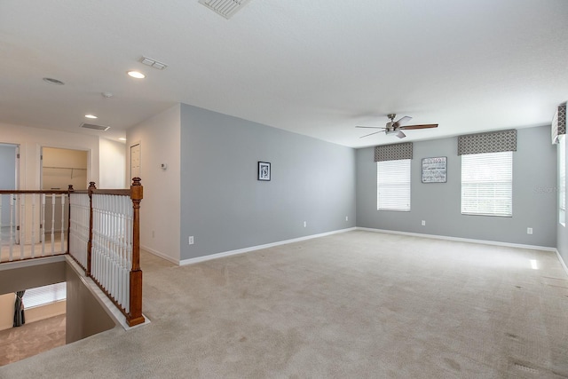 563 Copperdale Ave, Winter Garden, FL 34787 - unfurnished room with light colored carpet, recessed lighting, baseboards, visible vents, and a ceiling fan